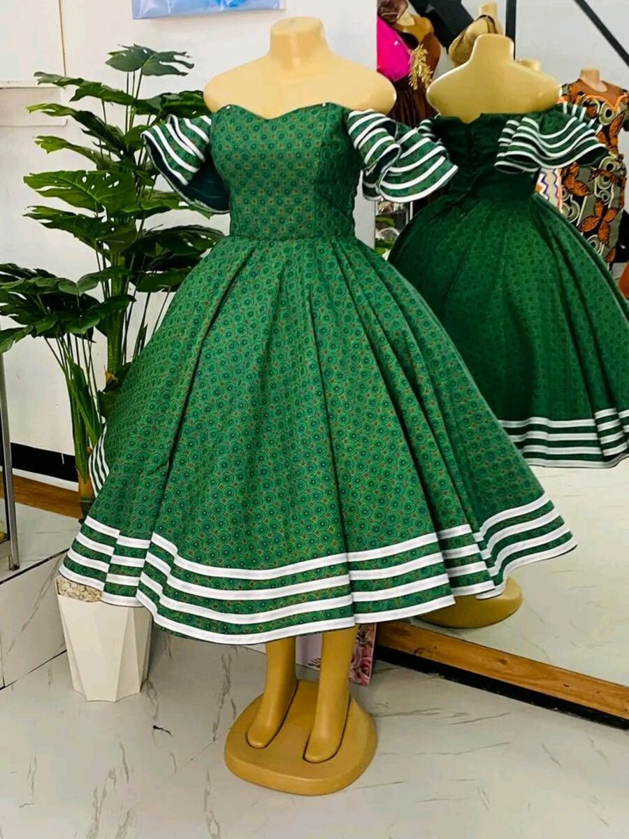 Group in matching green misisi attire